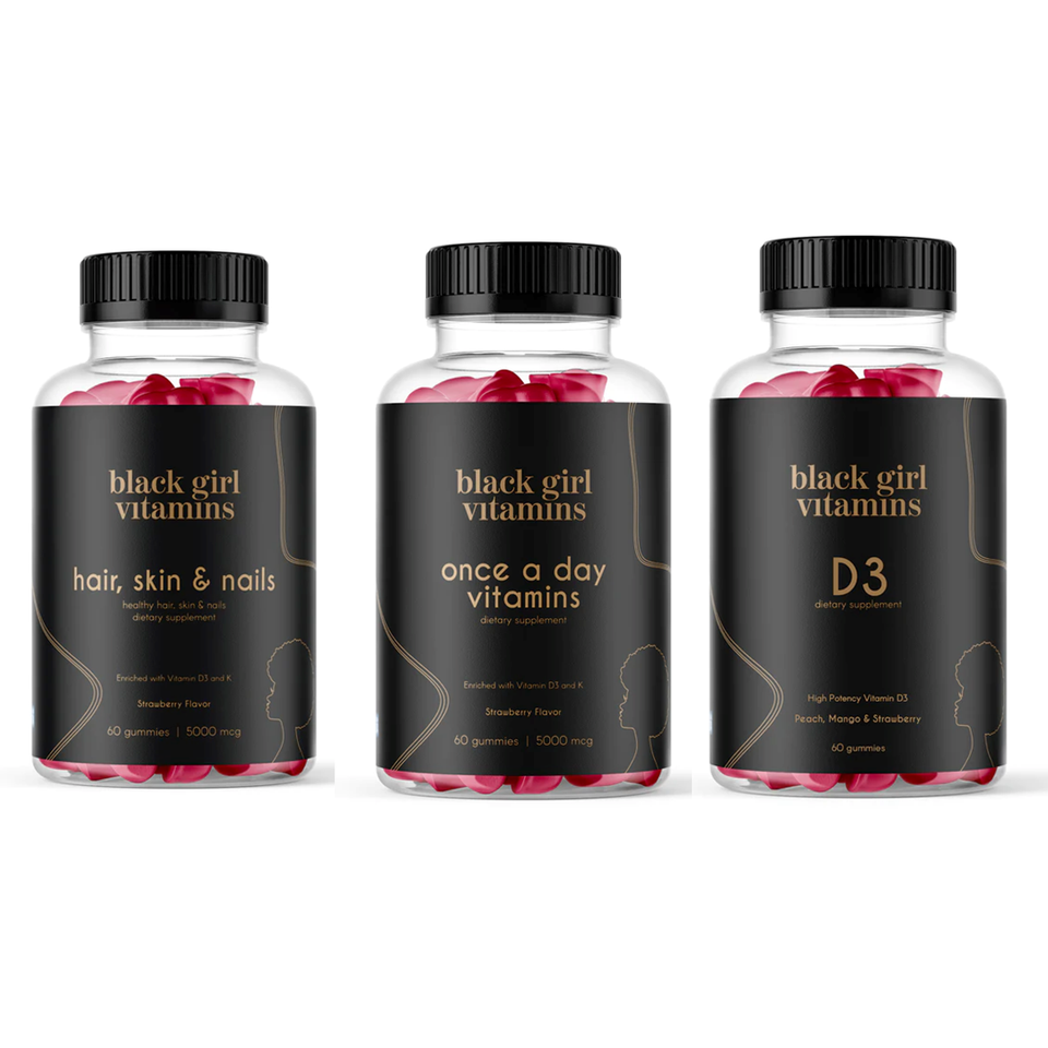 Three Black Girl Vitamins bottles: Hair, Skin & Nails with Strawberry Flavor; Once a Day Vitamins with Strawberry Flavor; D3 with Peach, Mango & Strawberry flavors.